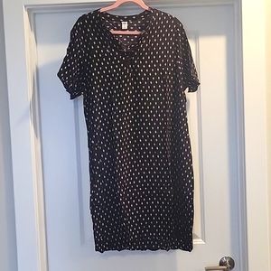 Women's black dress with white paisley pattern